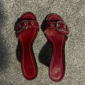 Red backless shoes with front buckle